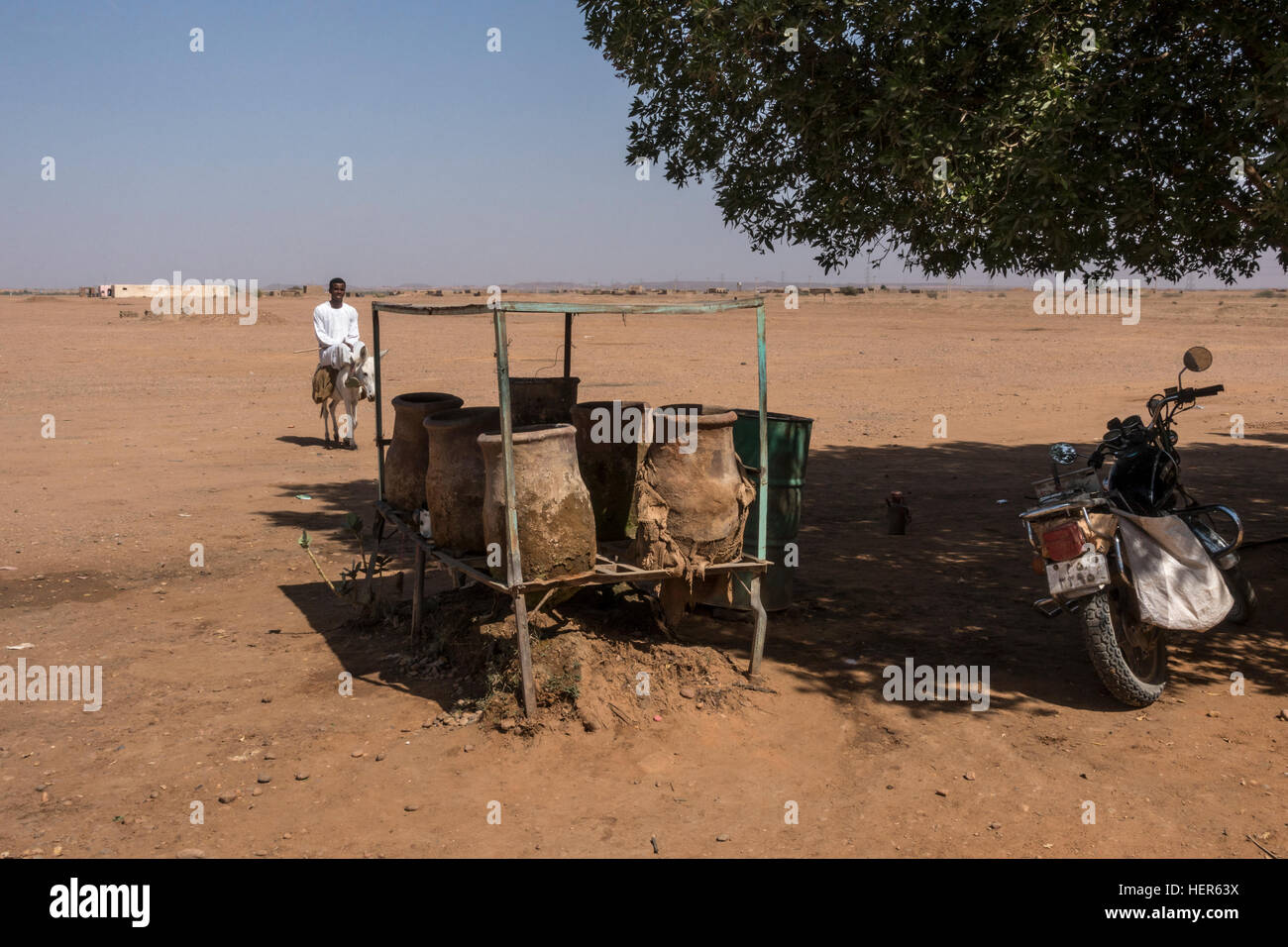 Water jugs in the desert, Sudan, Africa Stock Photo - Alamy