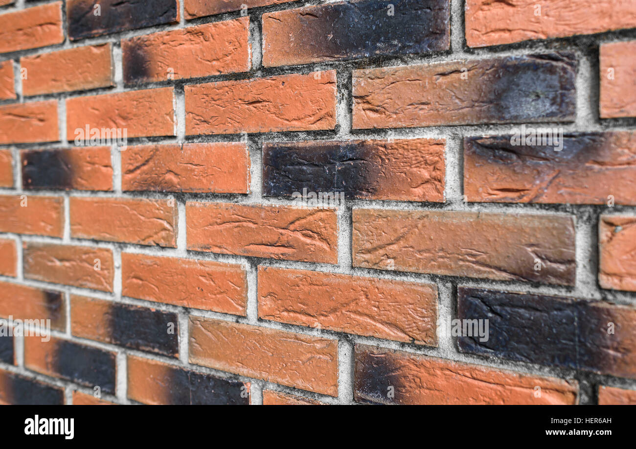 Close perspective of new red brick house brick, Stock Photo