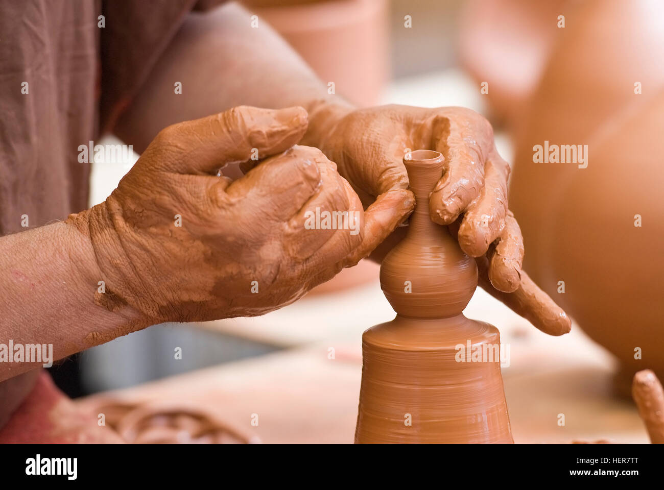 Potter working with clay Stock Photo Alamy