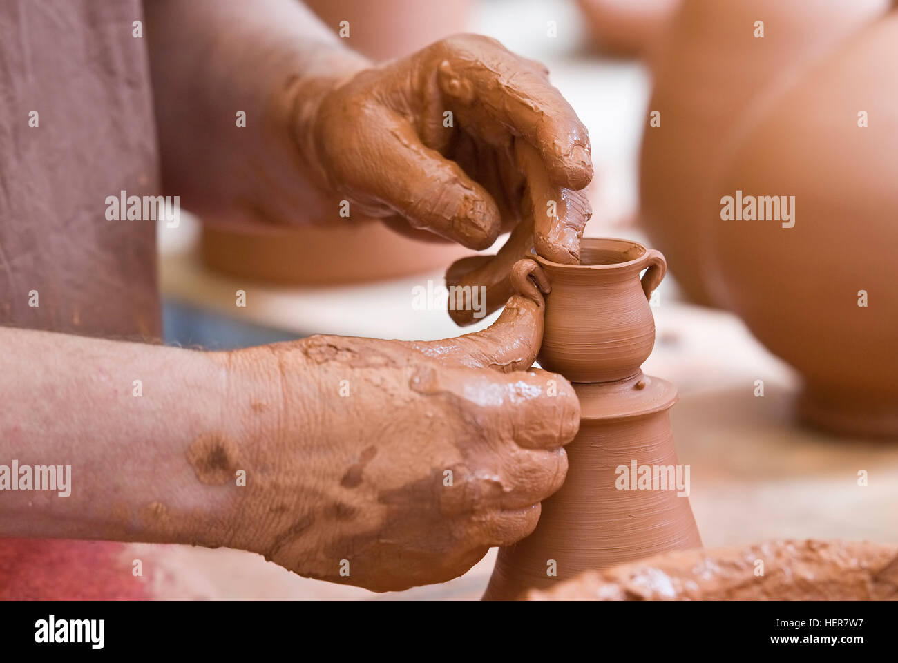 Potter working with clay Stock Photo Alamy