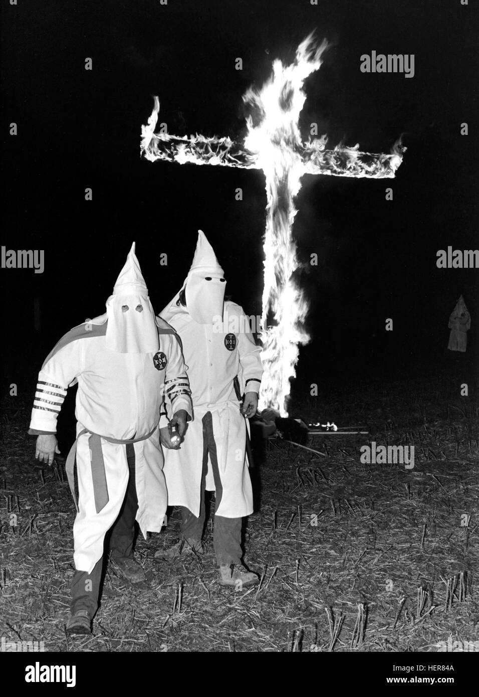 Cross Burning at Ku Klux Klan Rally - Macon, Georgia - 1975. Stock Photo