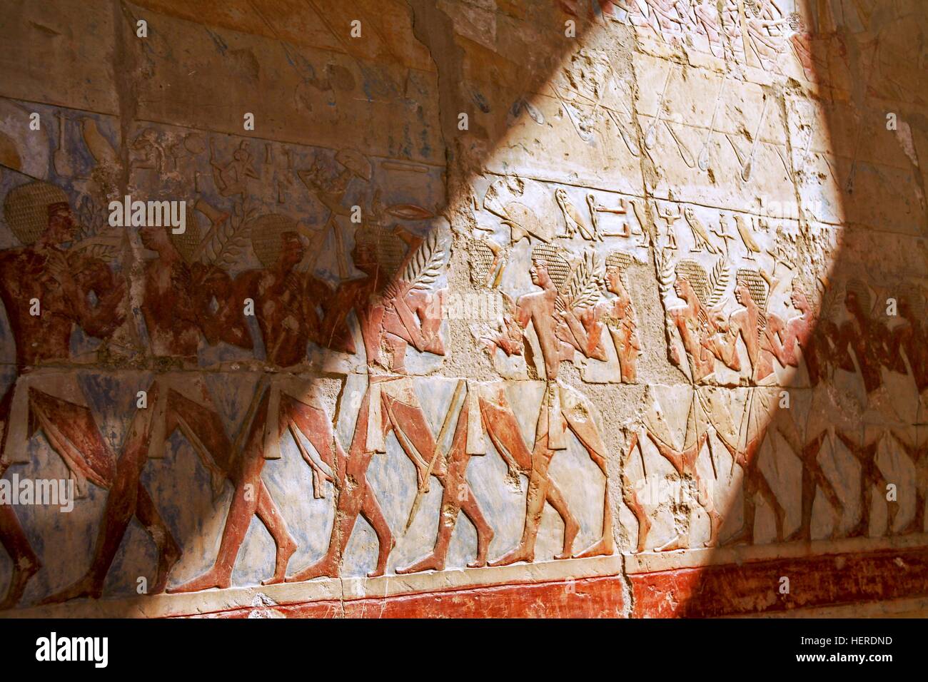 Ancient Egyptian Wall Mural Carving Paintings inside Queen Hatshepsut Temple in Valley of the Kings near Luxor, Egypt Stock Photo