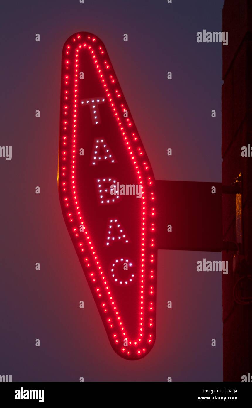 French red Tabac sign at night Stock Photo