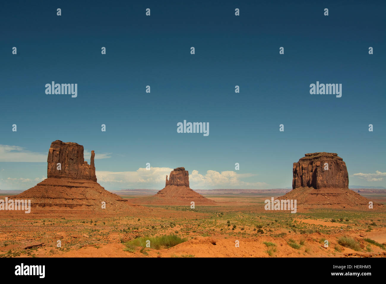 Red Sand Dunes And Mitten At Monument Valley, Arizona Stock Photo, Picture  and Royalty Free Image. Image 14626468.