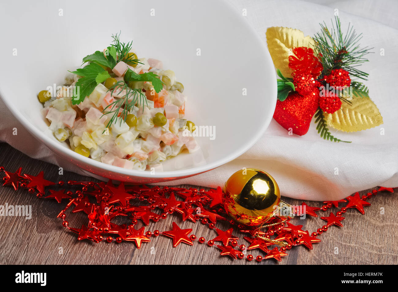 Russian Traditional Salad Olivier With Pea On Wooden Table Near