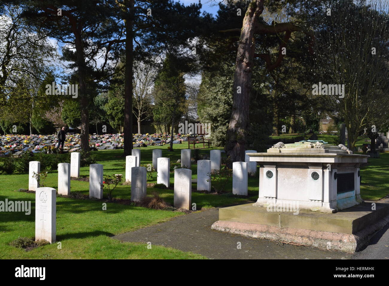 Australian Imperial Force War Graves in Stourbridge Cemetery, England against a wooded/shaded background Stock Photo