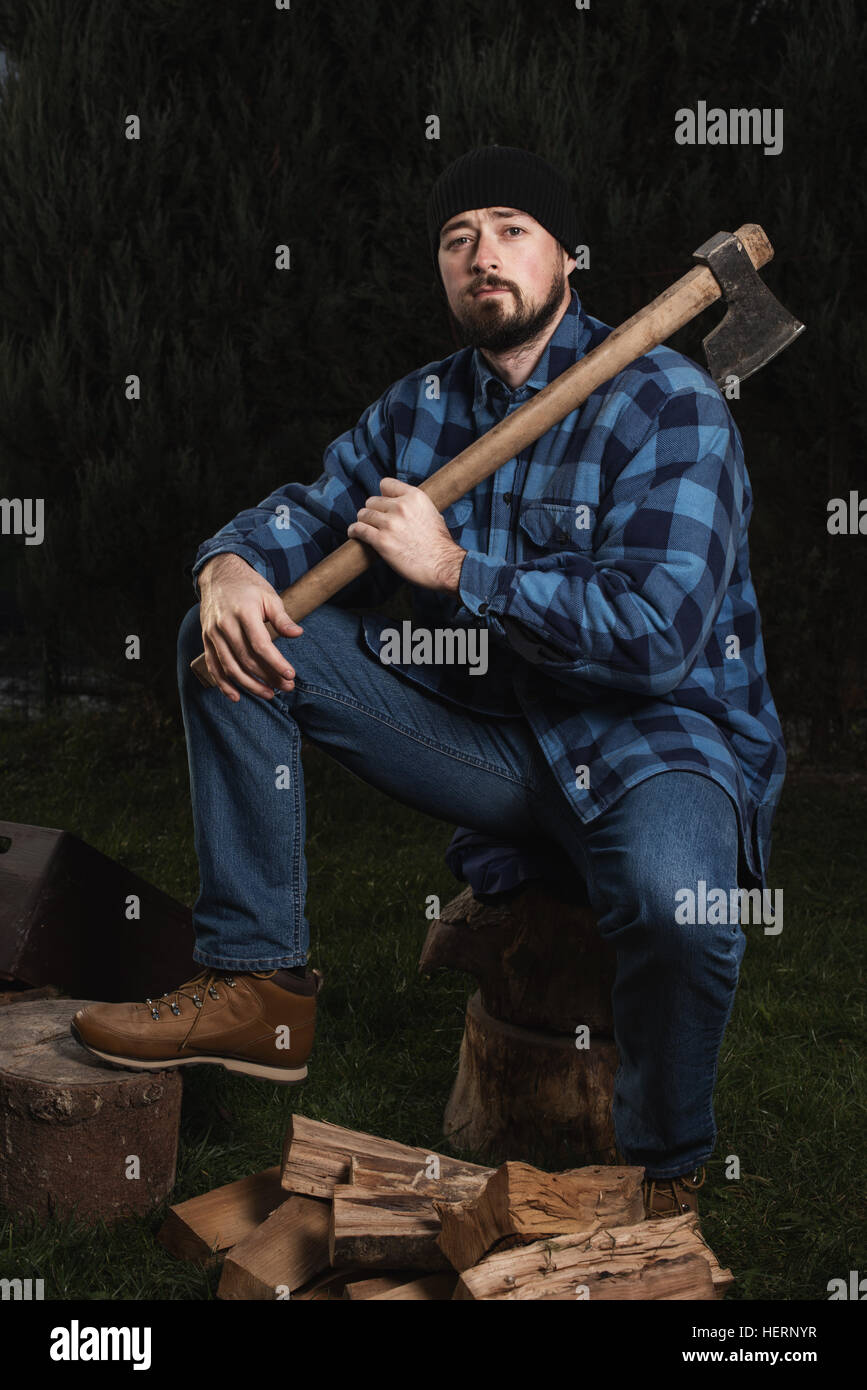 Black man sitting on log hi-res stock photography and images - Alamy