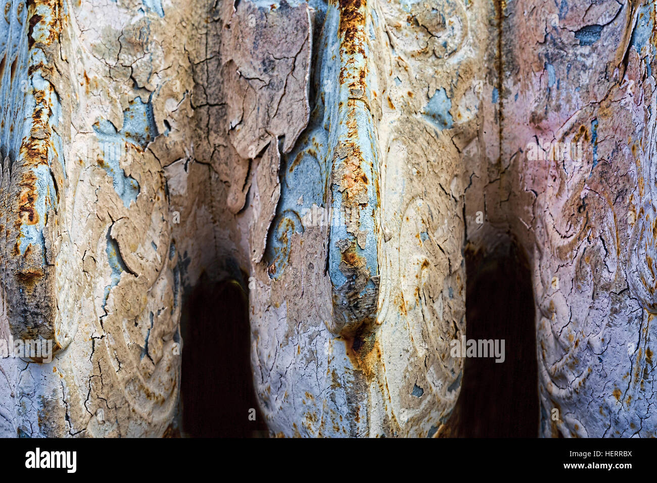 Top of old heating radiator in salvage yard coated with age, paint, and ...