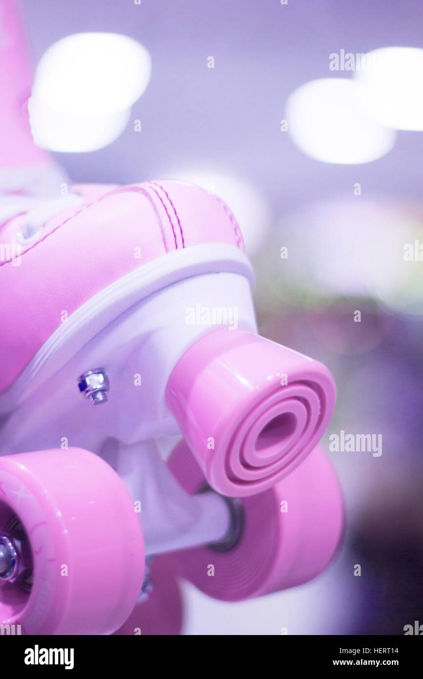 Childrens quad skate rollerskates in skate store in shop window display