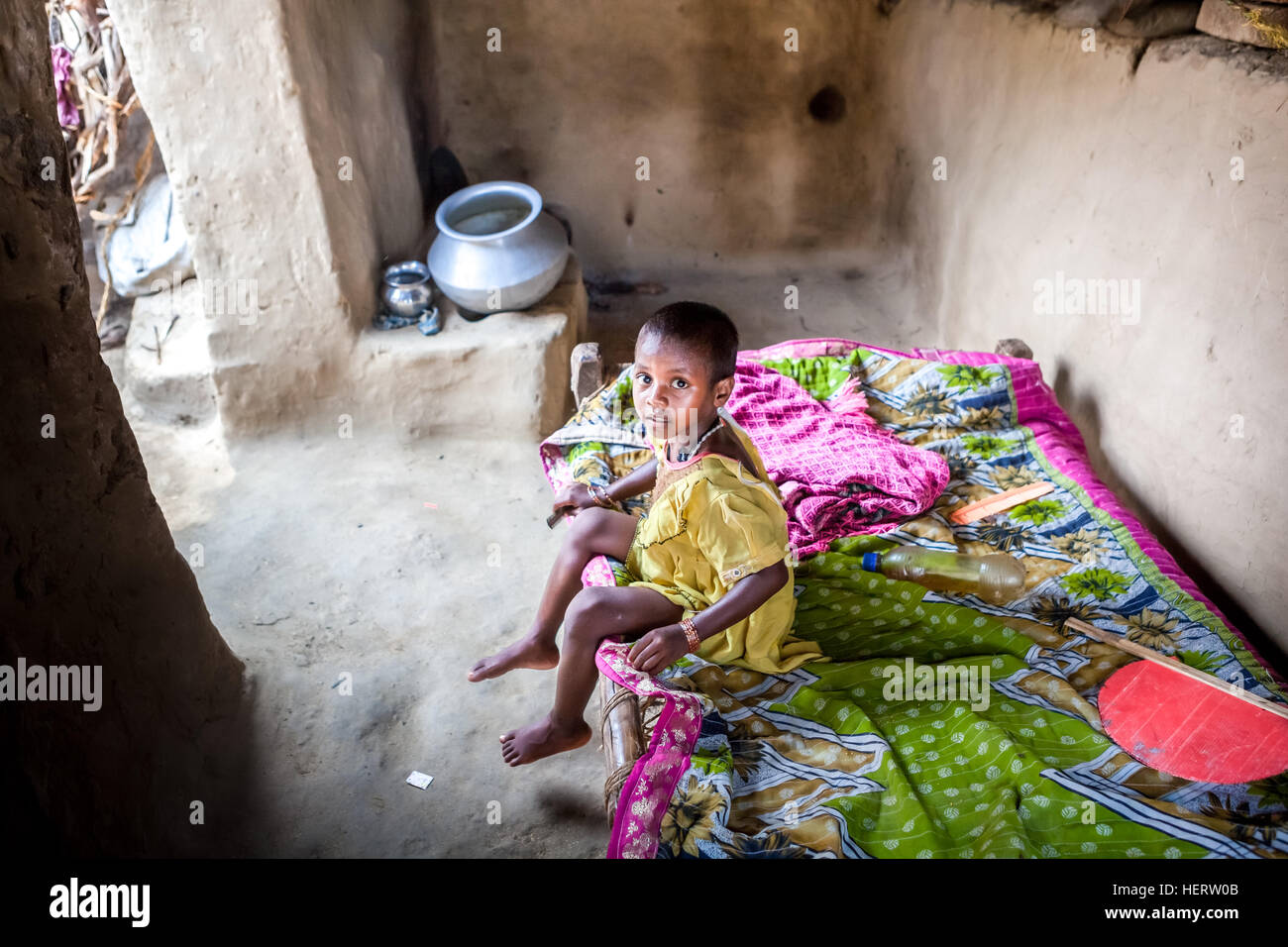 Portrait of a child inside her room in Faldu agricultural village, Nawada district, Bihar, India. Stock Photo
