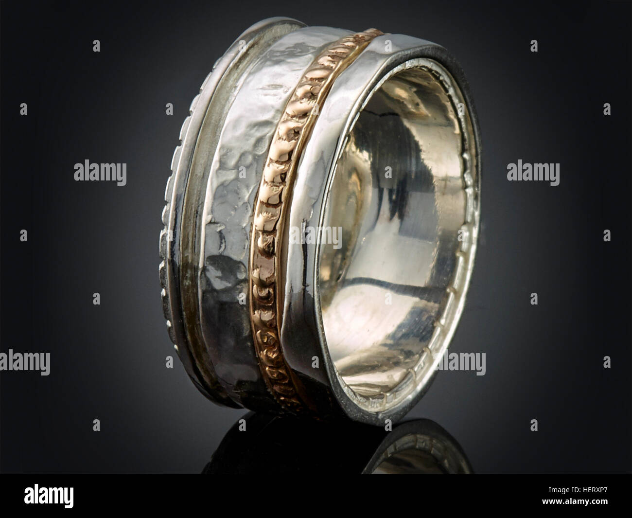 beautiful silver ring isolated on black background. Stock Photo