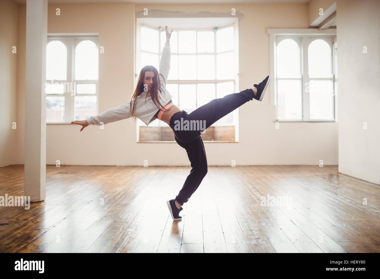 Pretty woman practising hip hop dance in studio Stock Photo Alamy