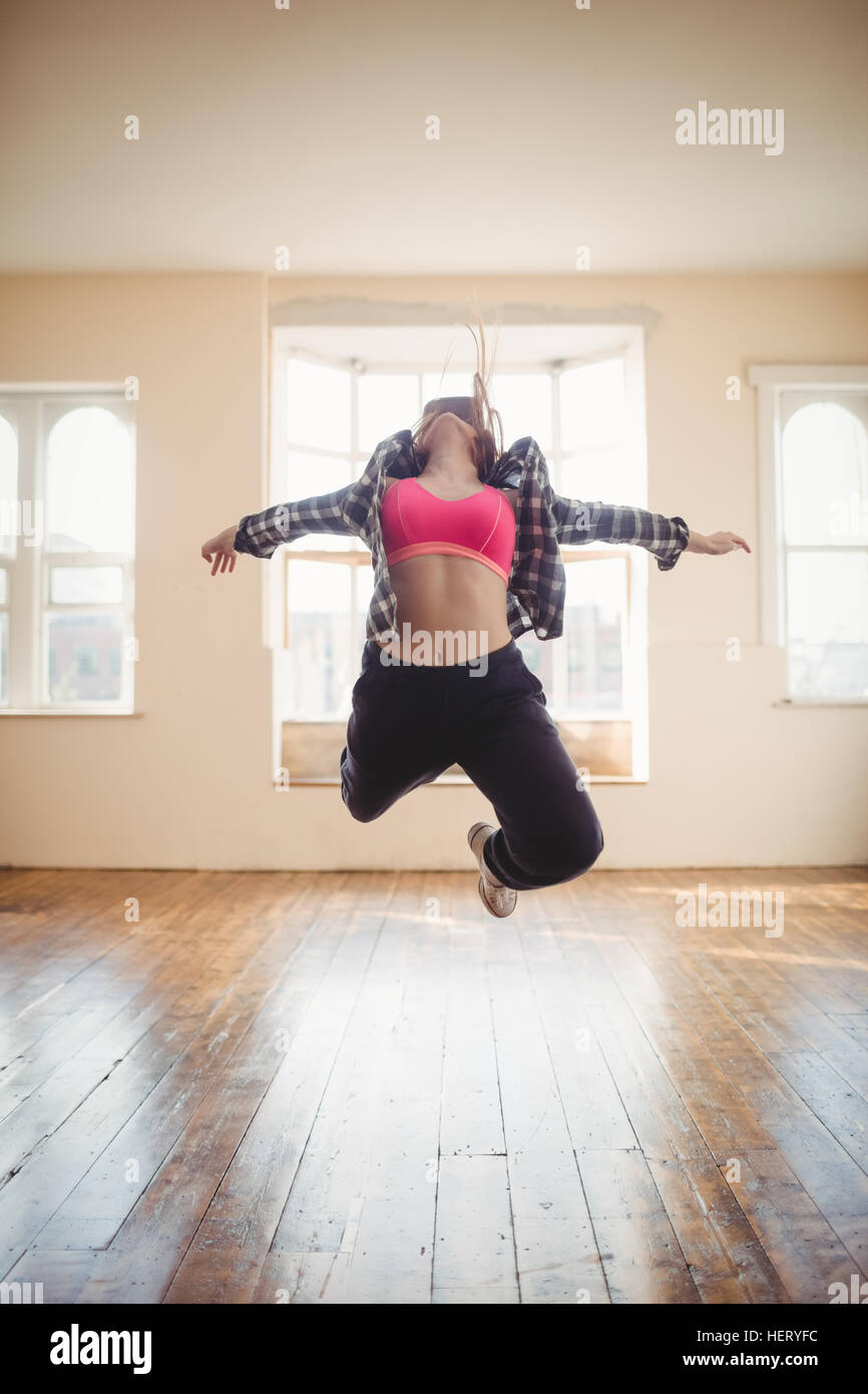Young woman practising hip hop dance in studio Stock Photo Alamy