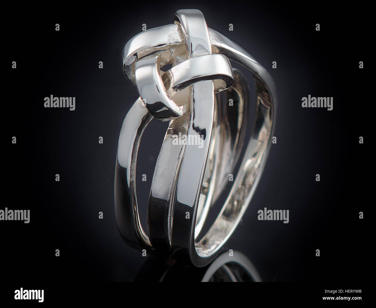 beautiful silver ring isolated on black background. Stock Photo