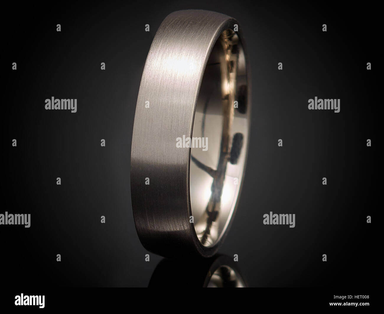 beautiful silver ring isolated on black background. Stock Photo