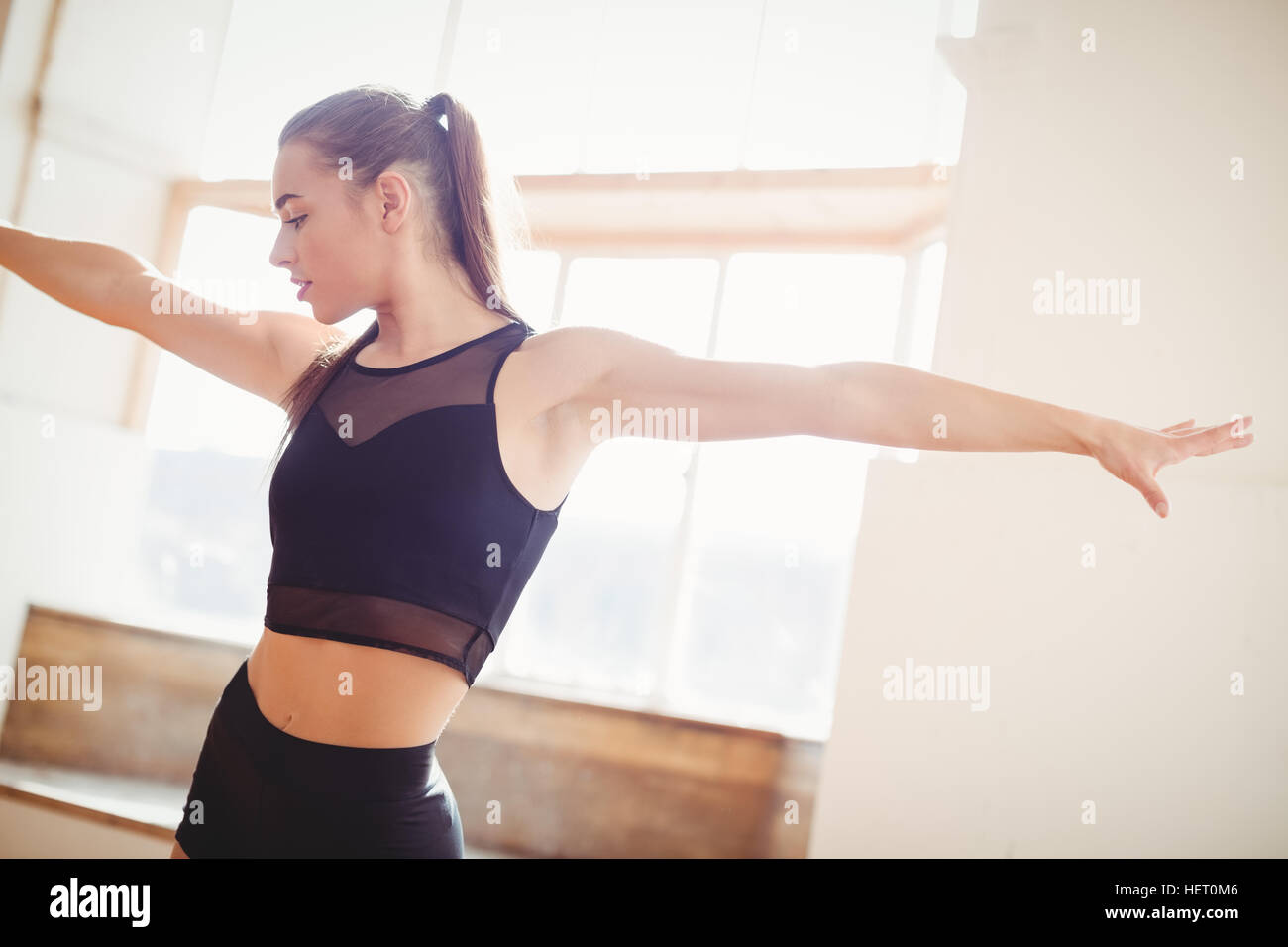Pretty woman practising hip hop dance in studio Stock Photo - Alamy