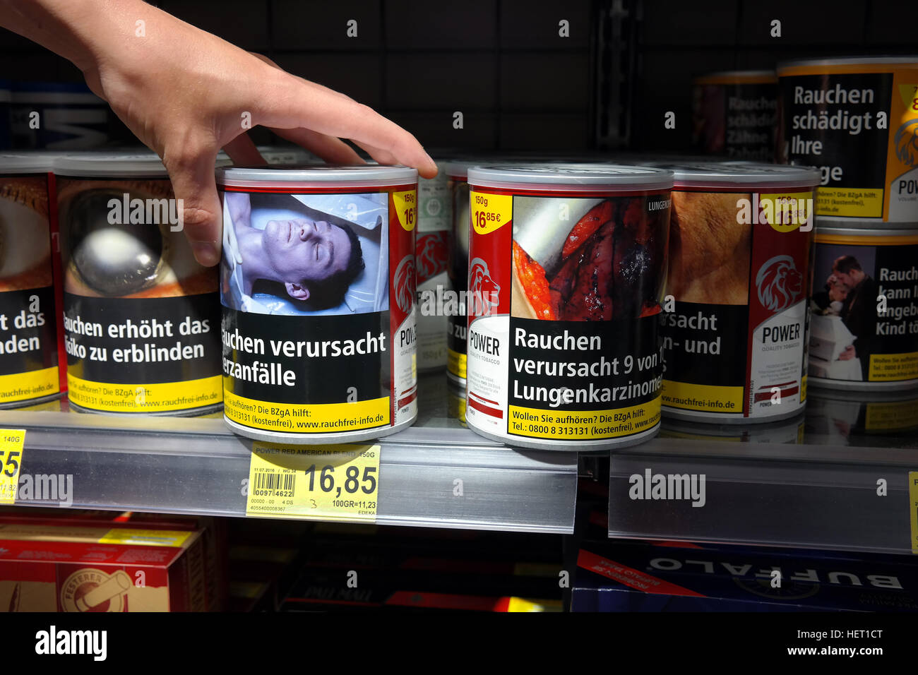 Terrifying images on tobacco drums Stock Photo
