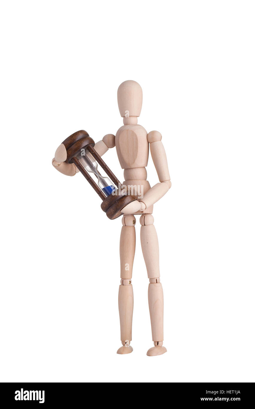 Wooden mannequin with hourglass Stock Photo - Alamy