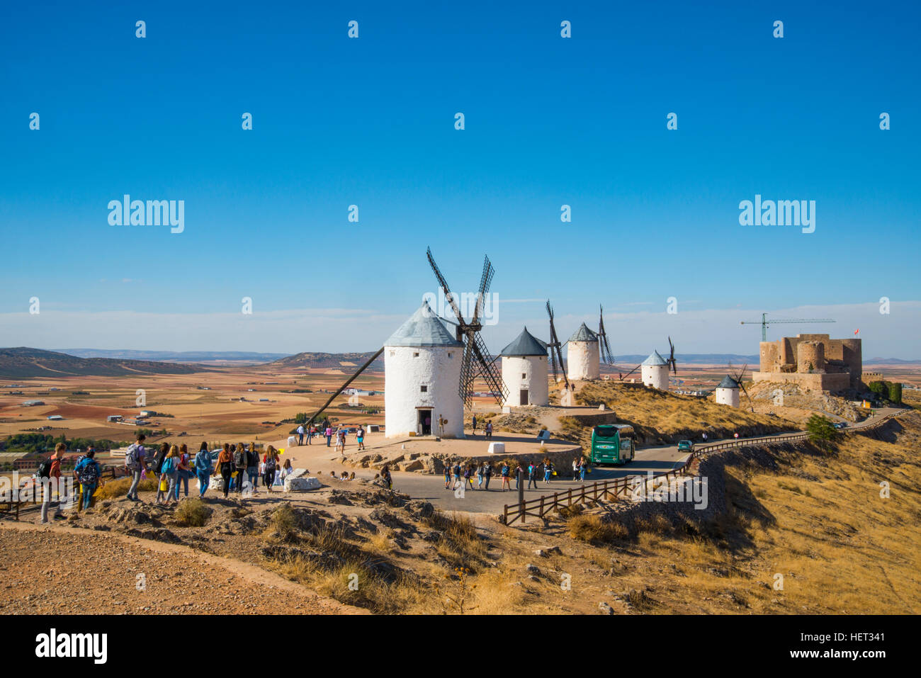 Tourists visiting the windmills. Consuegra, Toledo province, Castilla La Mancha, Spain. Stock Photo