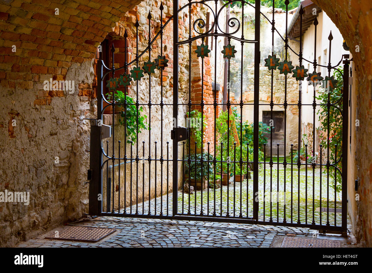 Gated entrance to courtyard and home in La Morra, Piemonte, Italy Stock Photo