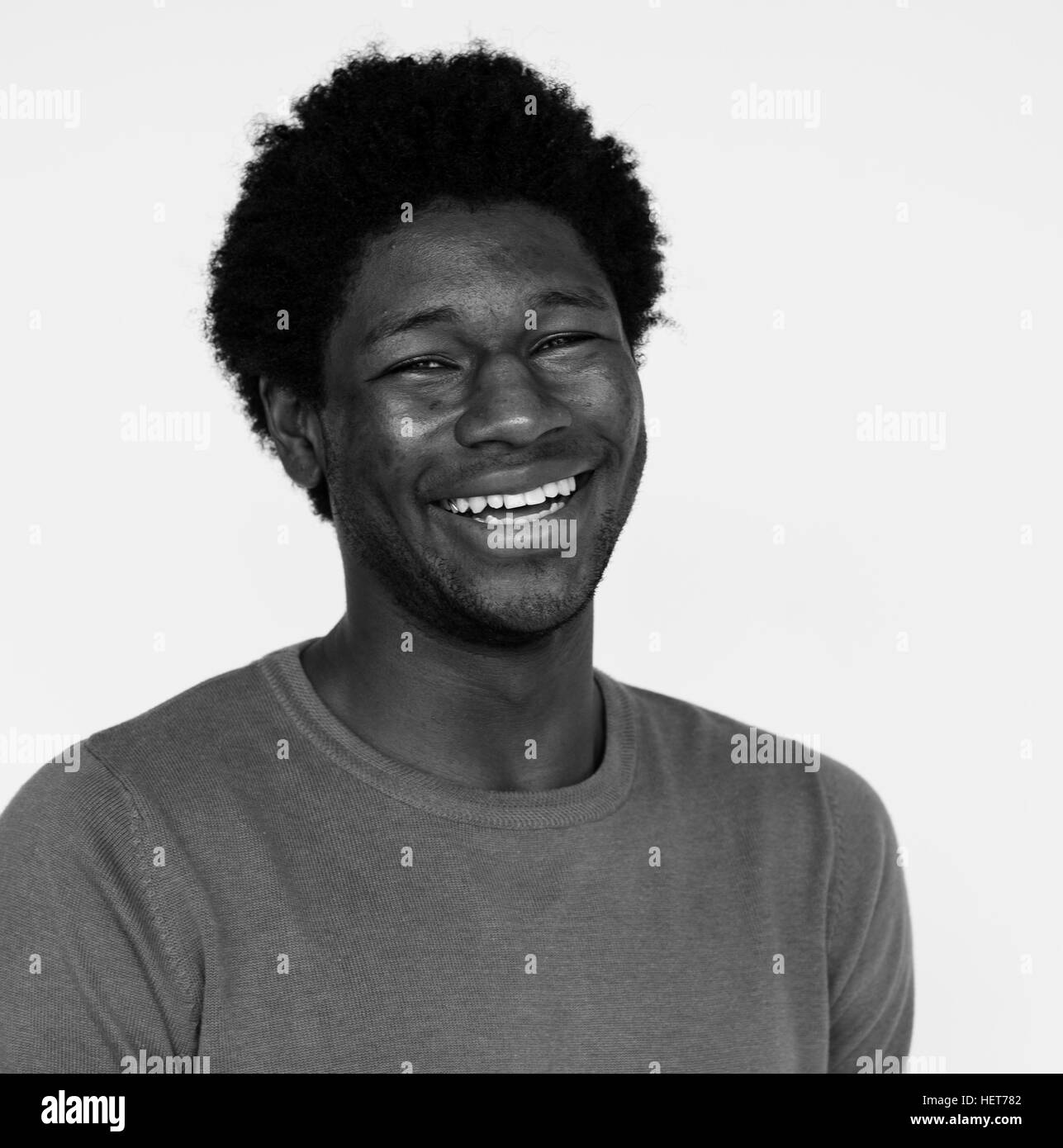 African young man standing Black and White Stock Photos & Images - Alamy