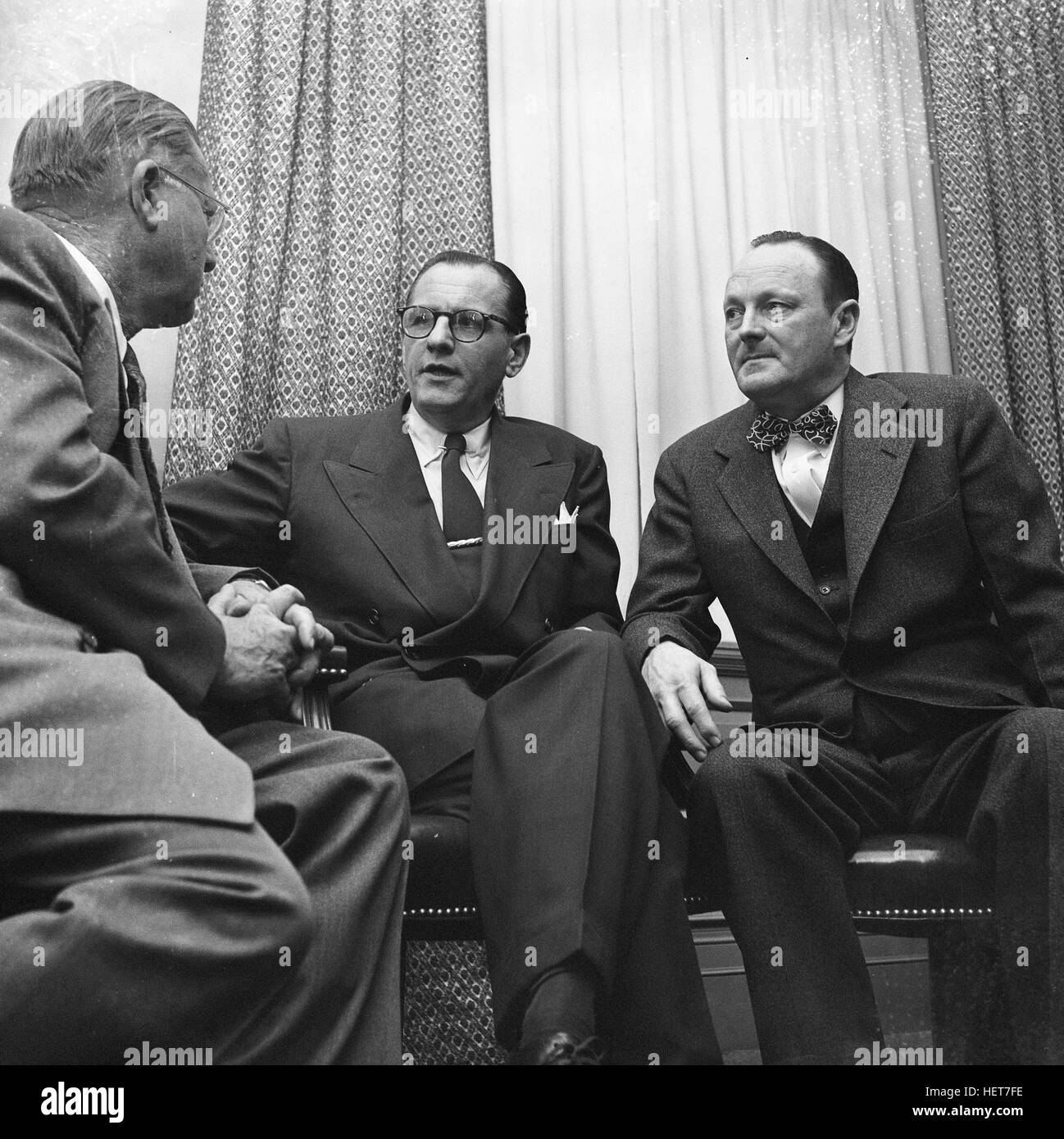 Erle Stanley Gardner, on left, speaking with James McGrattan and William Kerwick, the prosecutors who convicted Willie Sutton. Stock Photo