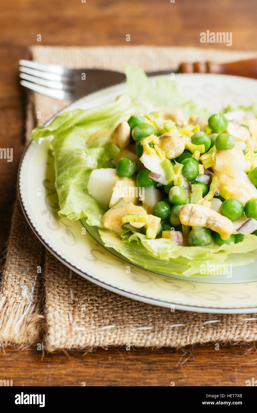 Crunchy Curried Pea Salad with Apples Cashews and Water Chestnuts Stock Photo