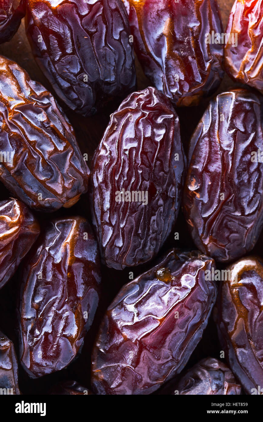 juicy ripe dates , focus on a center Stock Photo