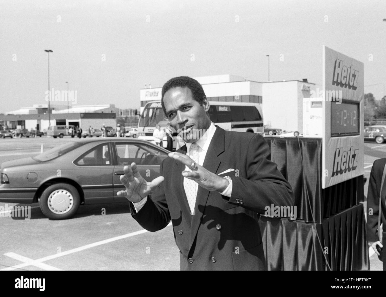 Athlete,spokesman and later - accused double murder O. J Simpson during a filming of a television ad at the Atlanta Airport. Simpson was the face of Hertz Rent a Car for many years. Orenthal James Simpson -born July 9, 1947, nicknamed 'the Juice', is a retired American football player, broadcaster, actor, and convicted felon currently incarcerated at the Lovelock Correctional Center in Nevada. Simpson played college football at the University of Southern California (USC), where he won the Heisman Trophy in 1968. He then played professionally in the National Football League (NFL) as a running b Stock Photo