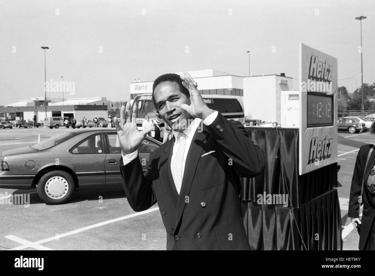 Athlete,spokesman and later - accused double murder O. J Simpson during a filming of a television ad at the Atlanta Airport. Simpson was the face of Hertz Rent a Car for many years. Orenthal James Simpson -born July 9, 1947, nicknamed 'the Juice', is a retired American football player, broadcaster, actor, and convicted felon currently incarcerated at the Lovelock Correctional Center in Nevada. Simpson played college football at the University of Southern California (USC), where he won the Heisman Trophy in 1968. He then played professionally in the National Football League (NFL) as a running b Stock Photo