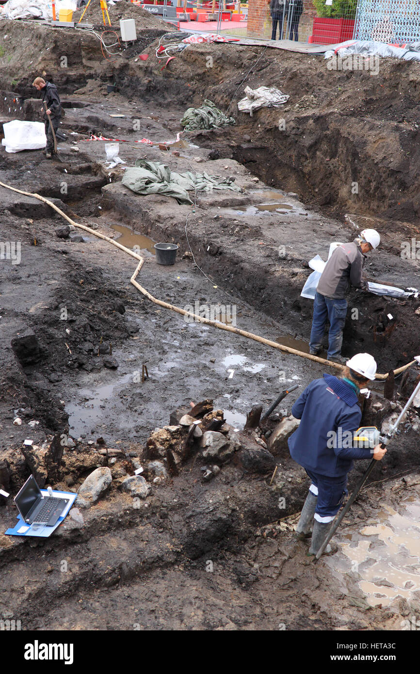 Odense, Denmark - October 3, 2016: Street being dug up with historical findings being tagged by archaeologists on site in Odense, Denmark, Scandinavia Stock Photo