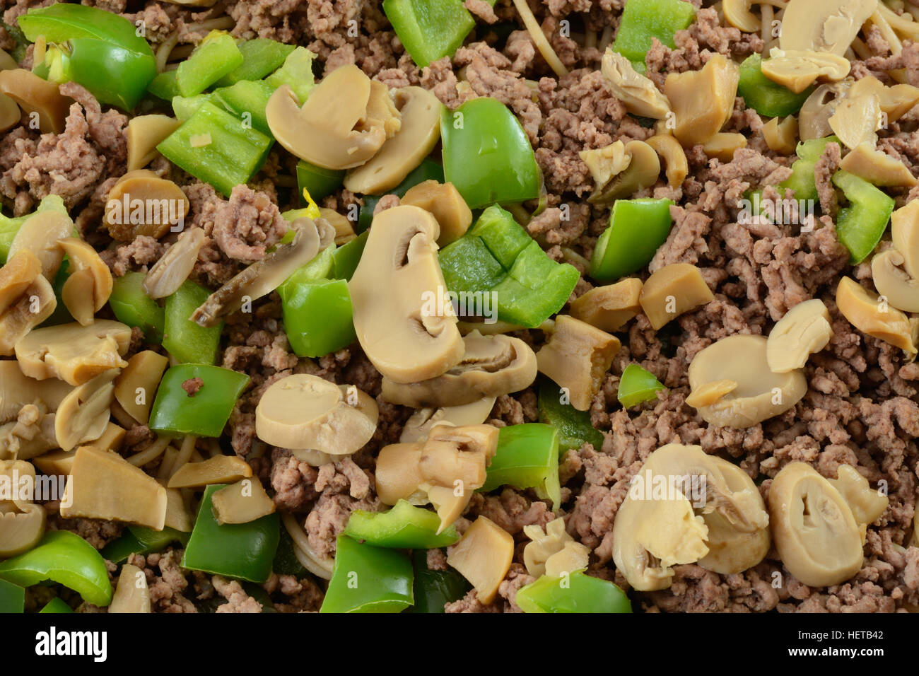 Spaghetti casserole layers of canned mushrooms, chopped green bell