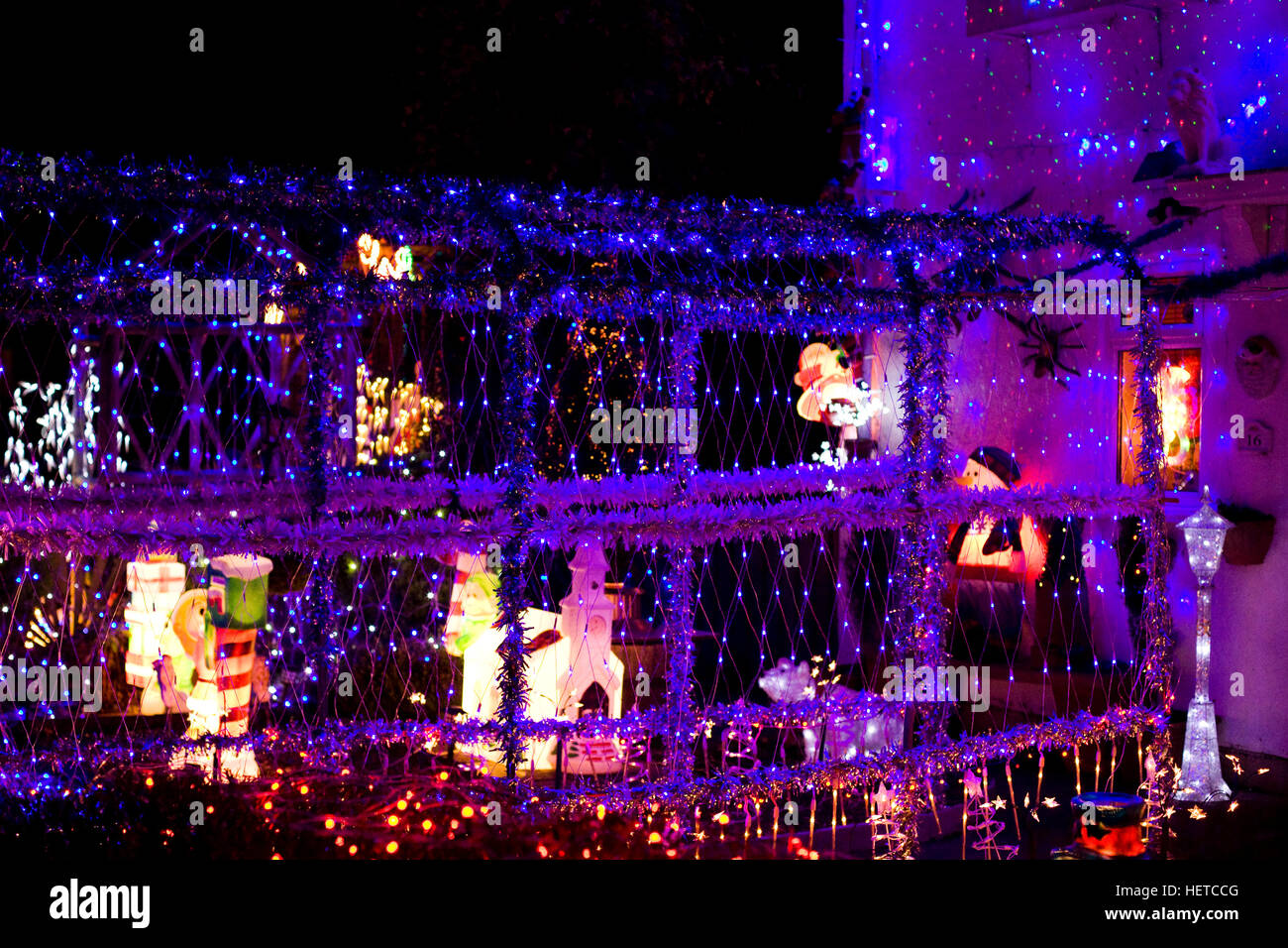 House in Oxfordshire lite up for Christmas Stock Photo