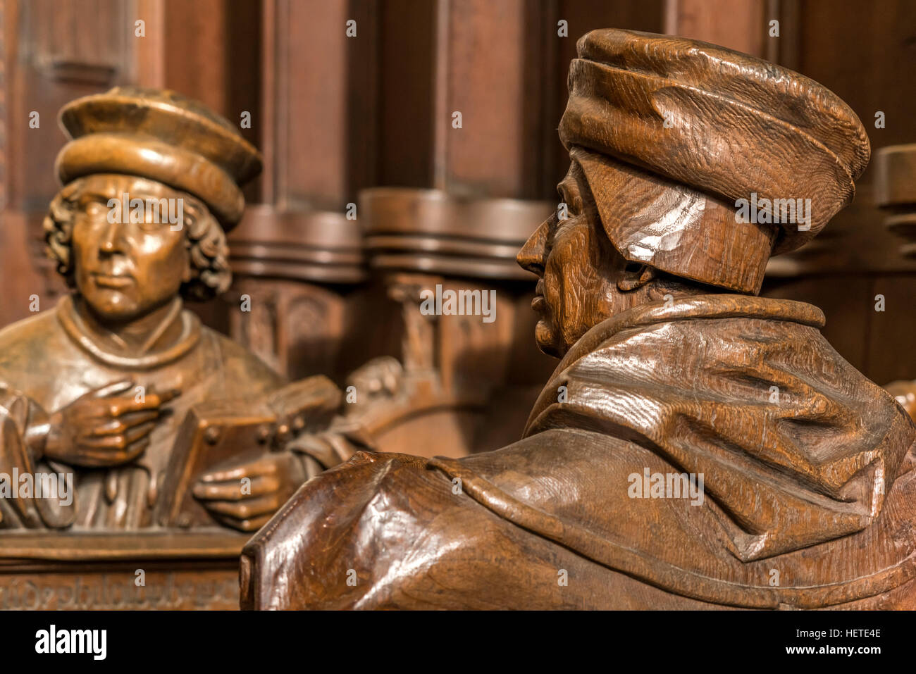 choir stalls with carved busts,  Ulm Minster interior, Ulm, Baden-Württemberg, Germany, Europe Stock Photo