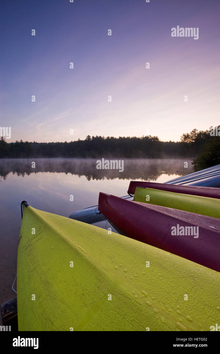 Kayaks next to Otter Lake at dawn in Greenfield State Park in Greenfield, New Hampshire Stock
