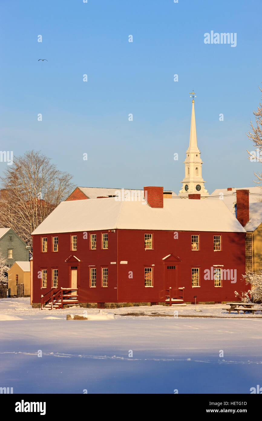 The steeple of the North Church rises above a house at Strawbery Banke Museum in Portsmouth, New Hampshire.  Winter. Stock Photo