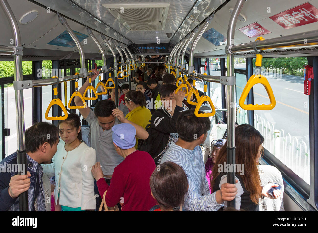 Chinese passengers on a public bus,Yinchuan, China Stock Photo