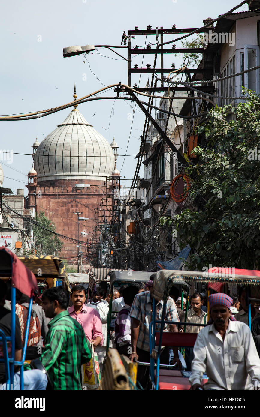 Rickshaws and dome of Jama Masjid Mosque in background, Old Delhi, India Stock Photo