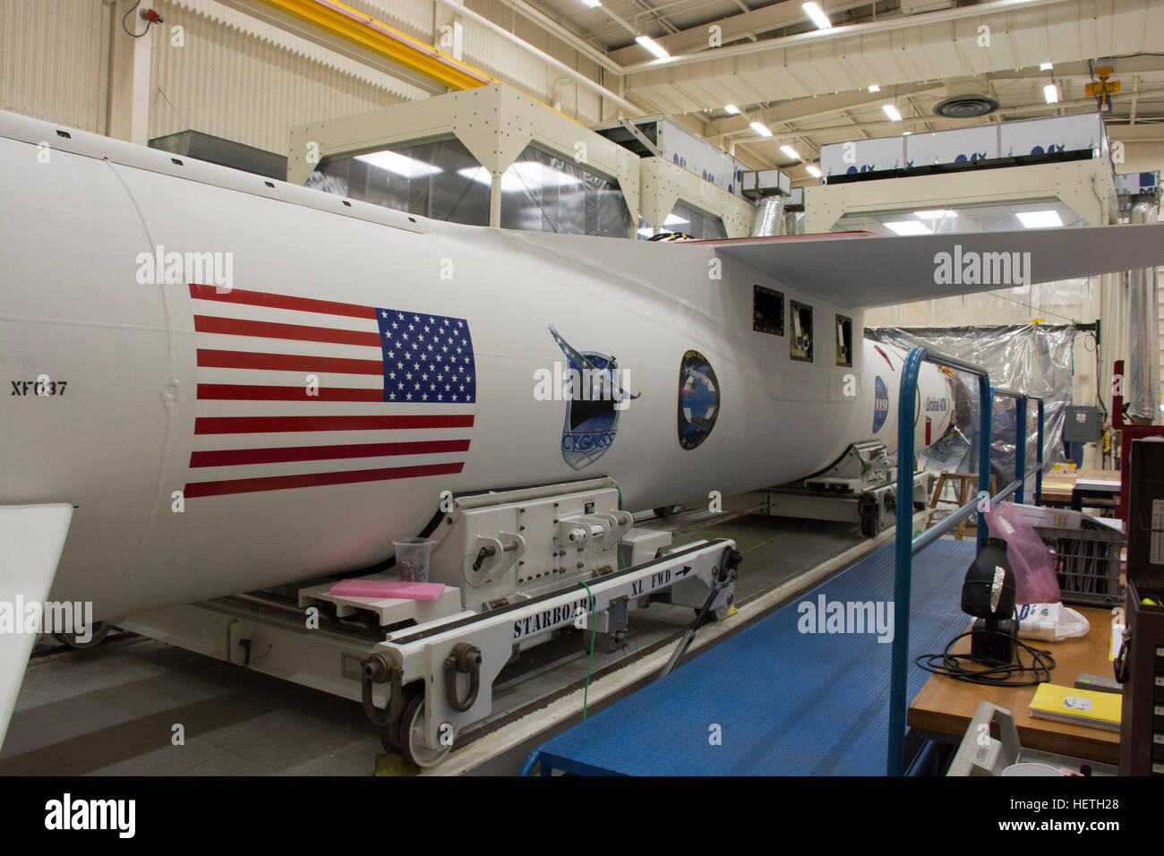 The payload fairing is installed on the Orbital ATK Pegasus XL rocket and NASA Cyclone Global Navigation Satellite System spacecraft during final pre-launch preparations at the Vandenberg Air Force Base Building 1555 November 11, 2016 near Lompoc, California. Stock Photo