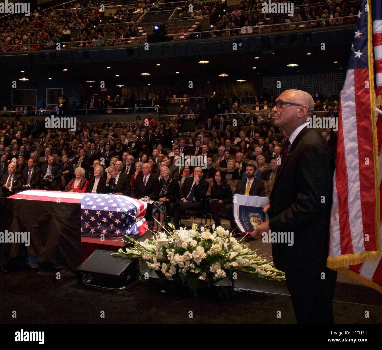 NASA Administrator Charles Bolden stands off-stage watching a video as he prepares to give a speech during the memorial service celebrating the life of former NASA astronaut and U.S. Senator John Glenn at the Ohio State University Mershon Auditorium December 17, 2016 in Columbus, Ohio. Stock Photo