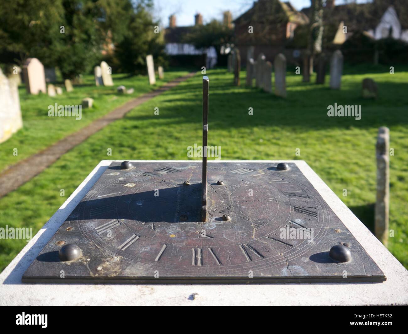 Sundial in an old English churchyard Stock Photo Alamy