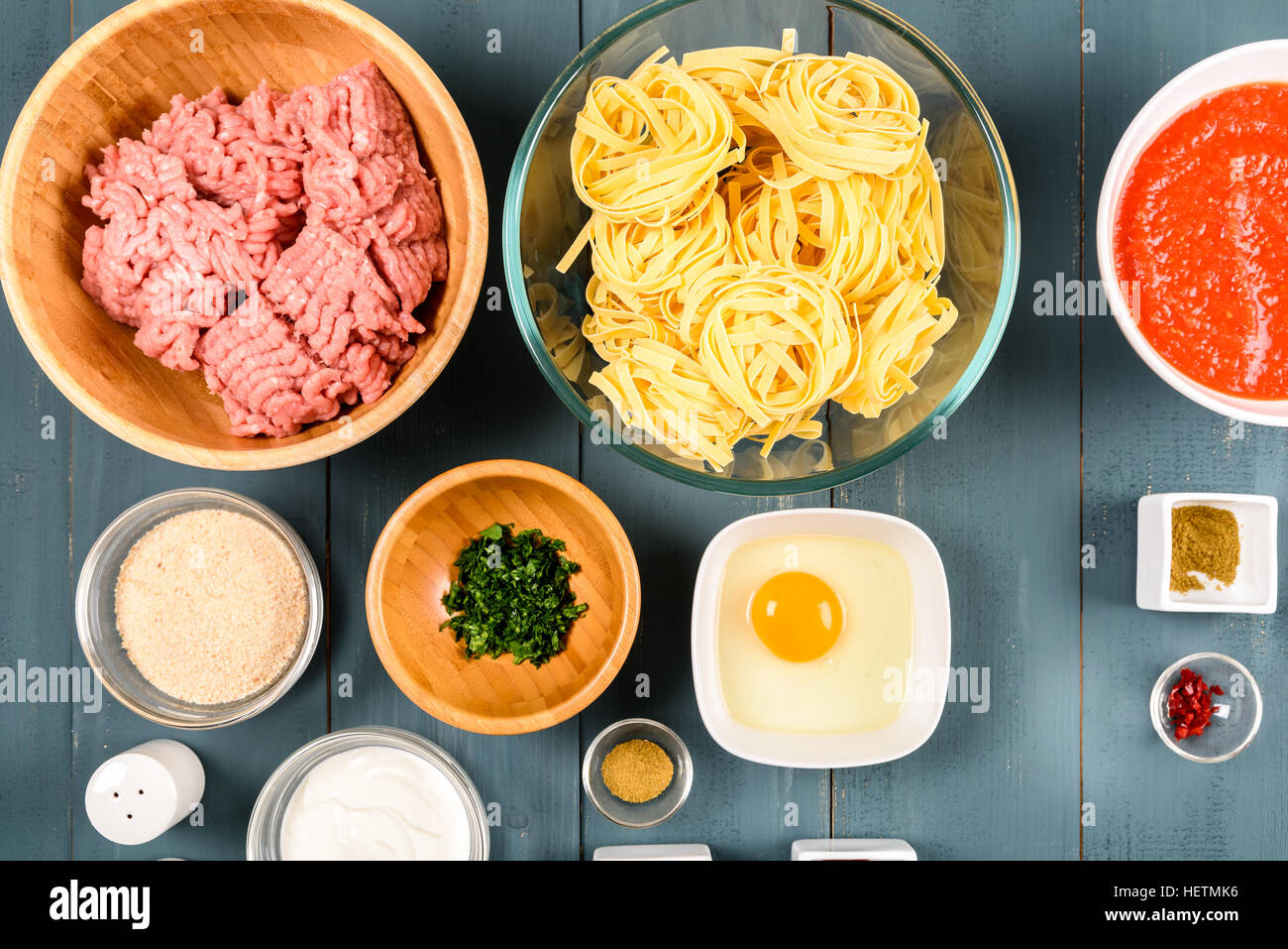 Food Ingredients For Harissa Turkey Meatballs And Pasta Stock Photo