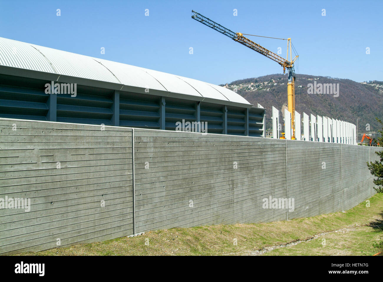 Noise barriers on the highway at Bissone on Switzerland Stock Photo