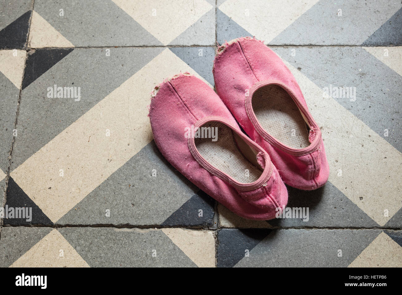 Detail of old and damaged child's pink dancing slippers or shoes Stock Photo Alamy