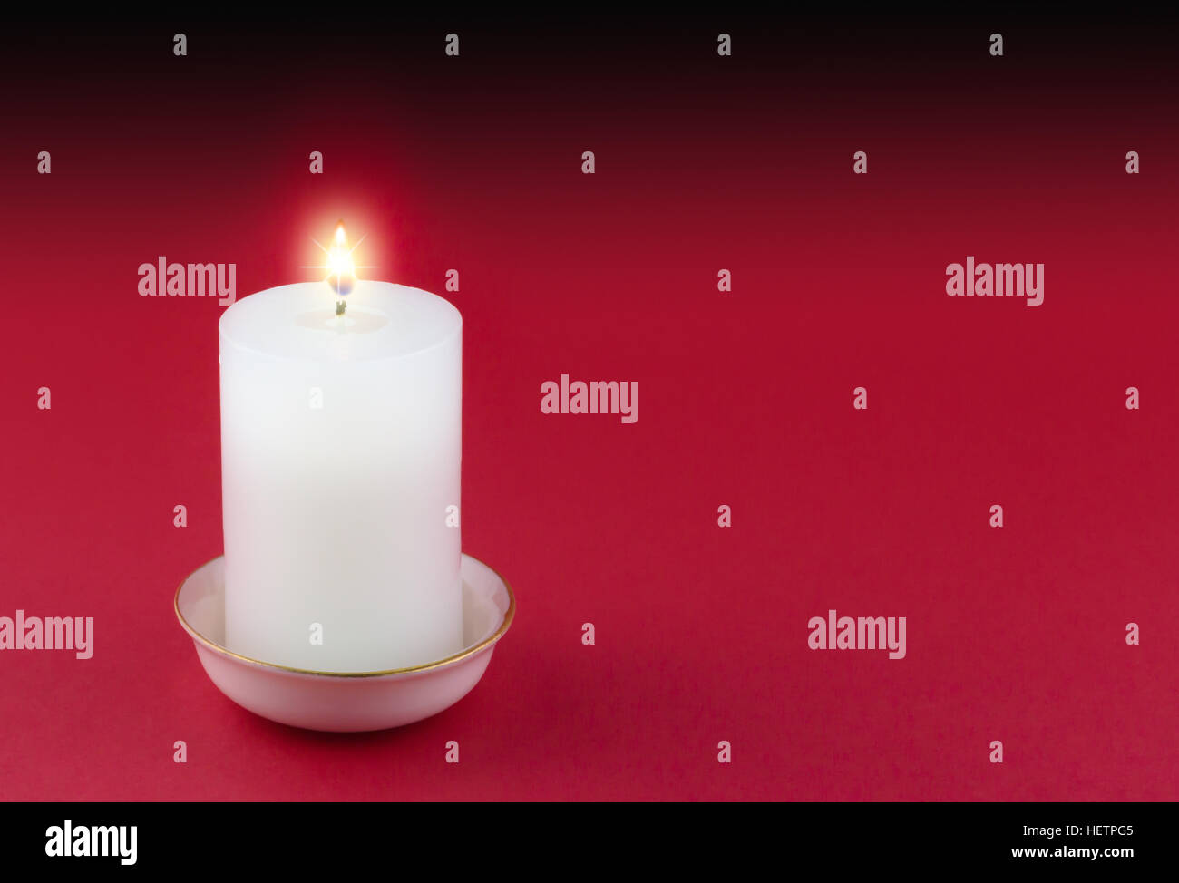 Lit candle white background hires stock photography and images Alamy