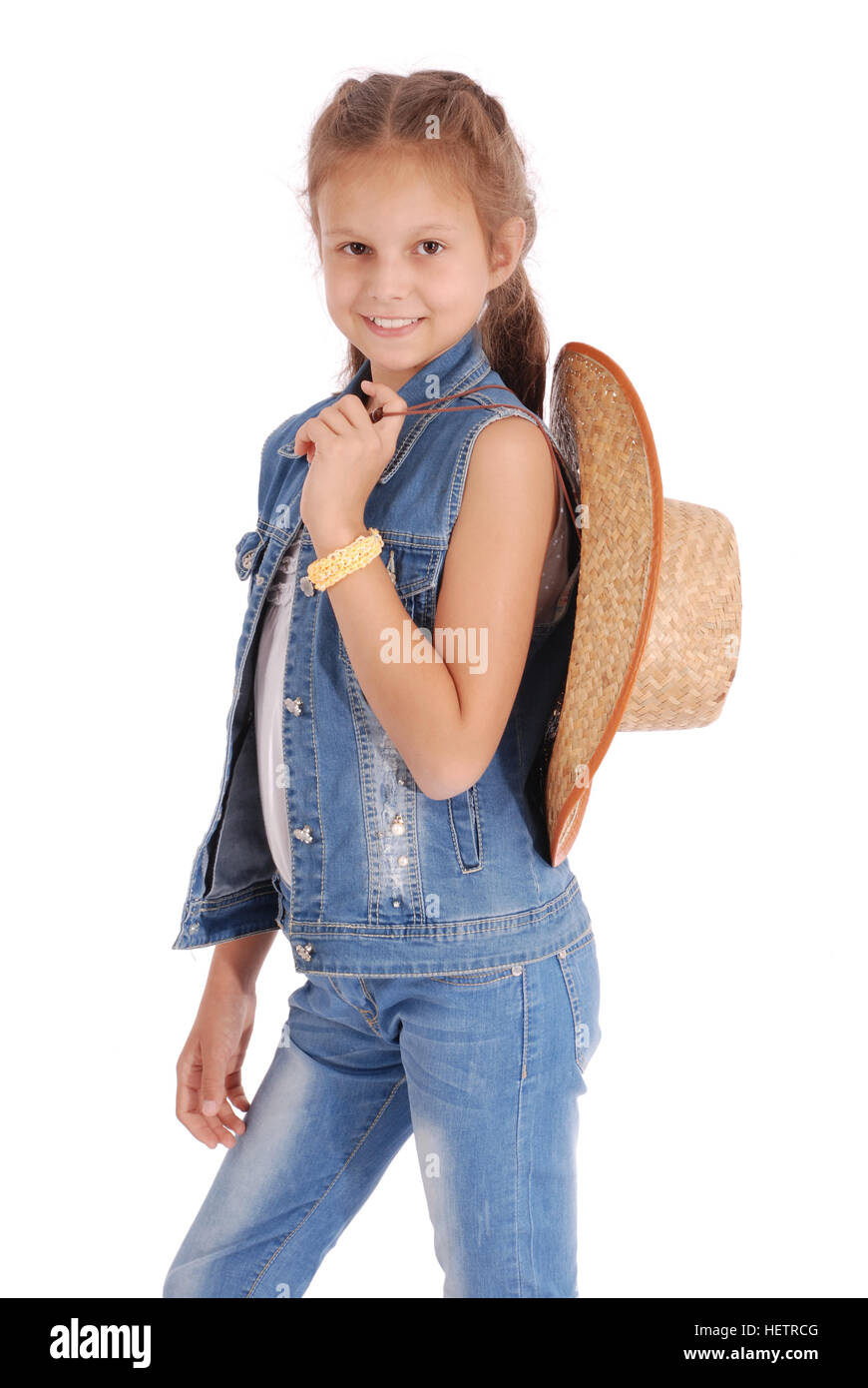 Pretty twelve year old girls wearing a big floppy straw sun hat isolated on  white Stock Photo - Alamy