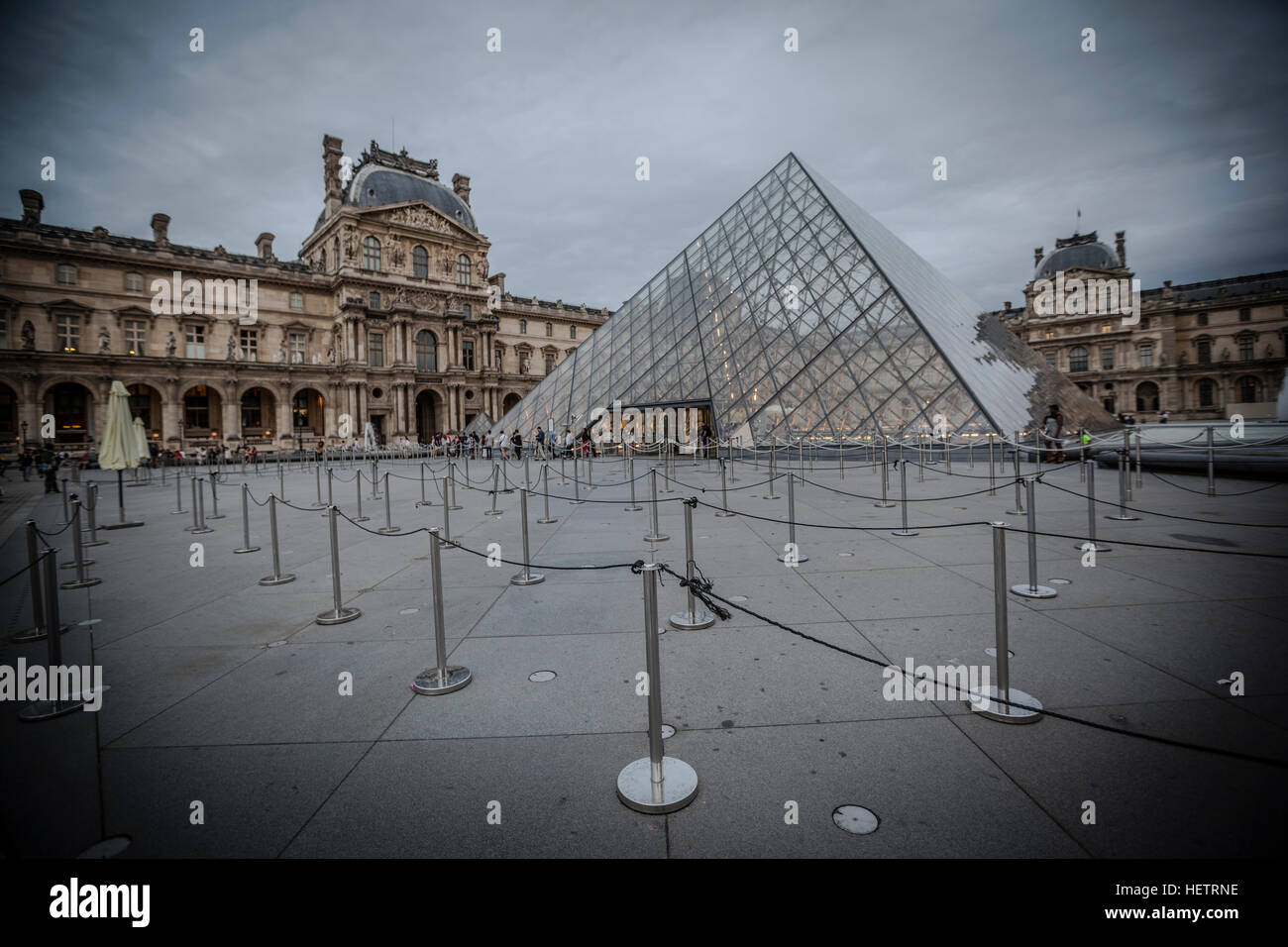 Louvre museum at dusk in Paris. This is one of the most popular tourist