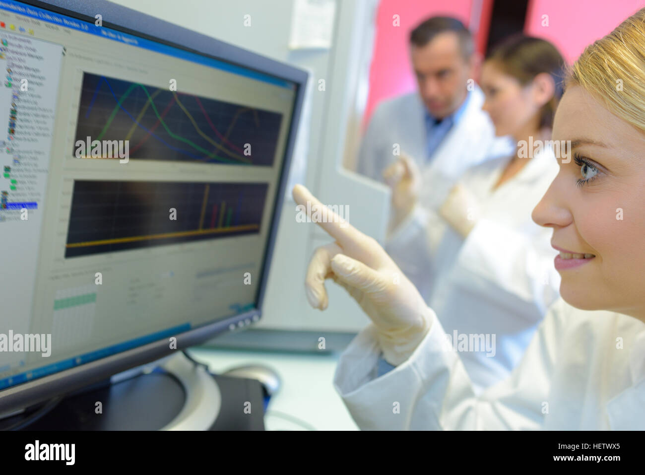 medical scientists using digital machinery at laboratory Stock Photo ...