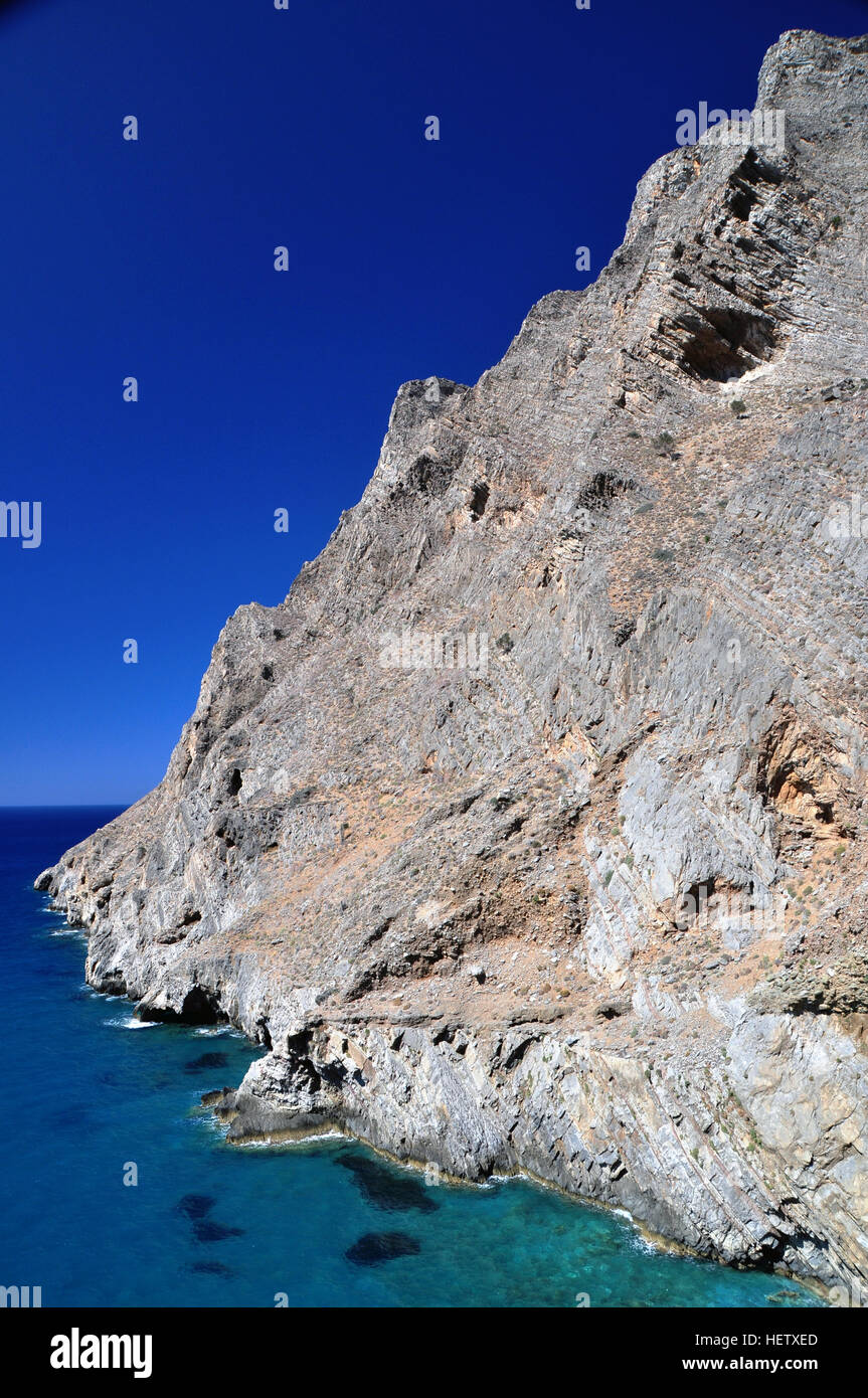 Coastal cliffs near Mochlos, Lasithi, Crete, Greece Stock Photo