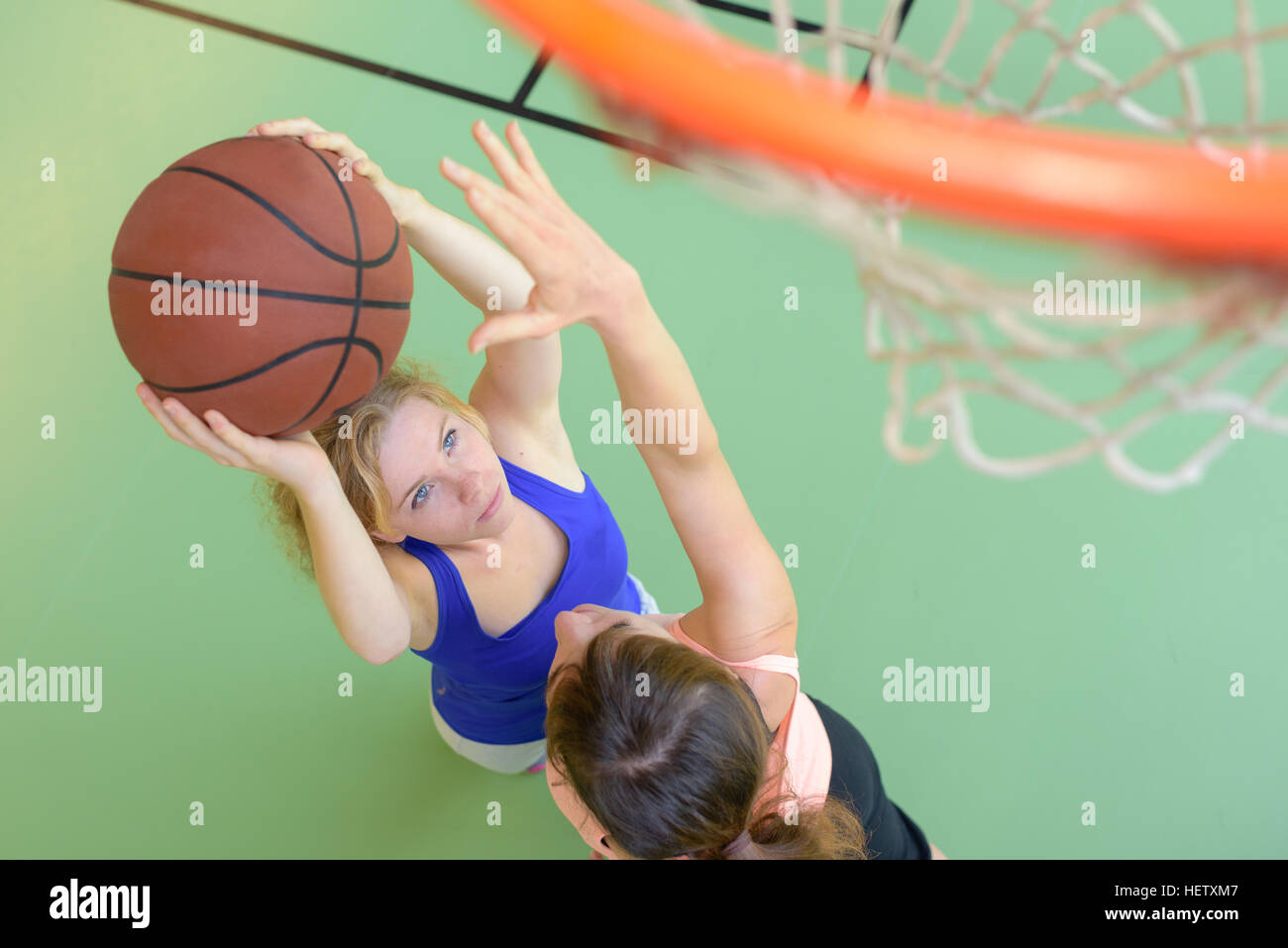 girls playing basketball Stock Photo